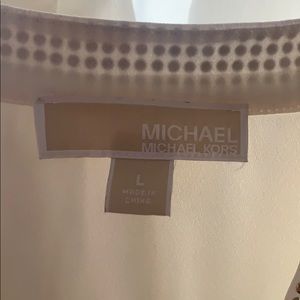 Michael Kors sleeveless blouse with gold details